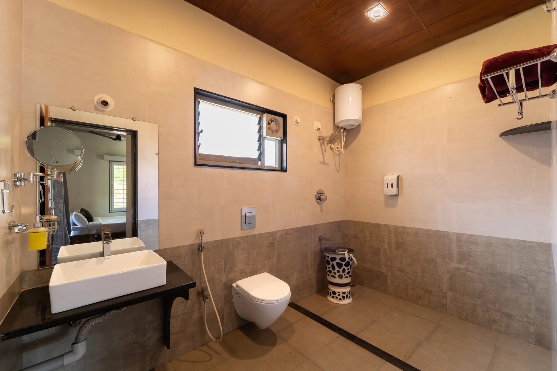 Deluxe Cottage attached bathroom at Nadi Teera, Dandeli
