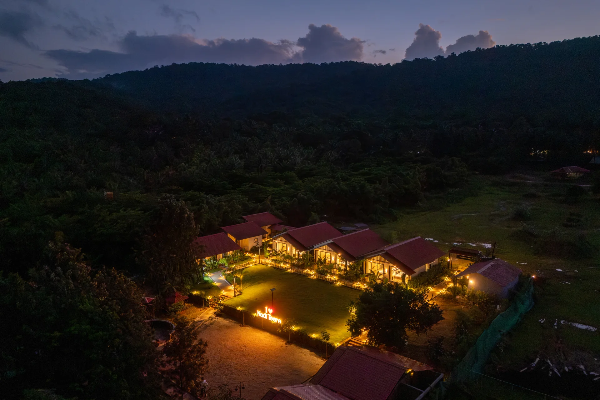 The resort after sunset at Nadi Teera, Dandeli