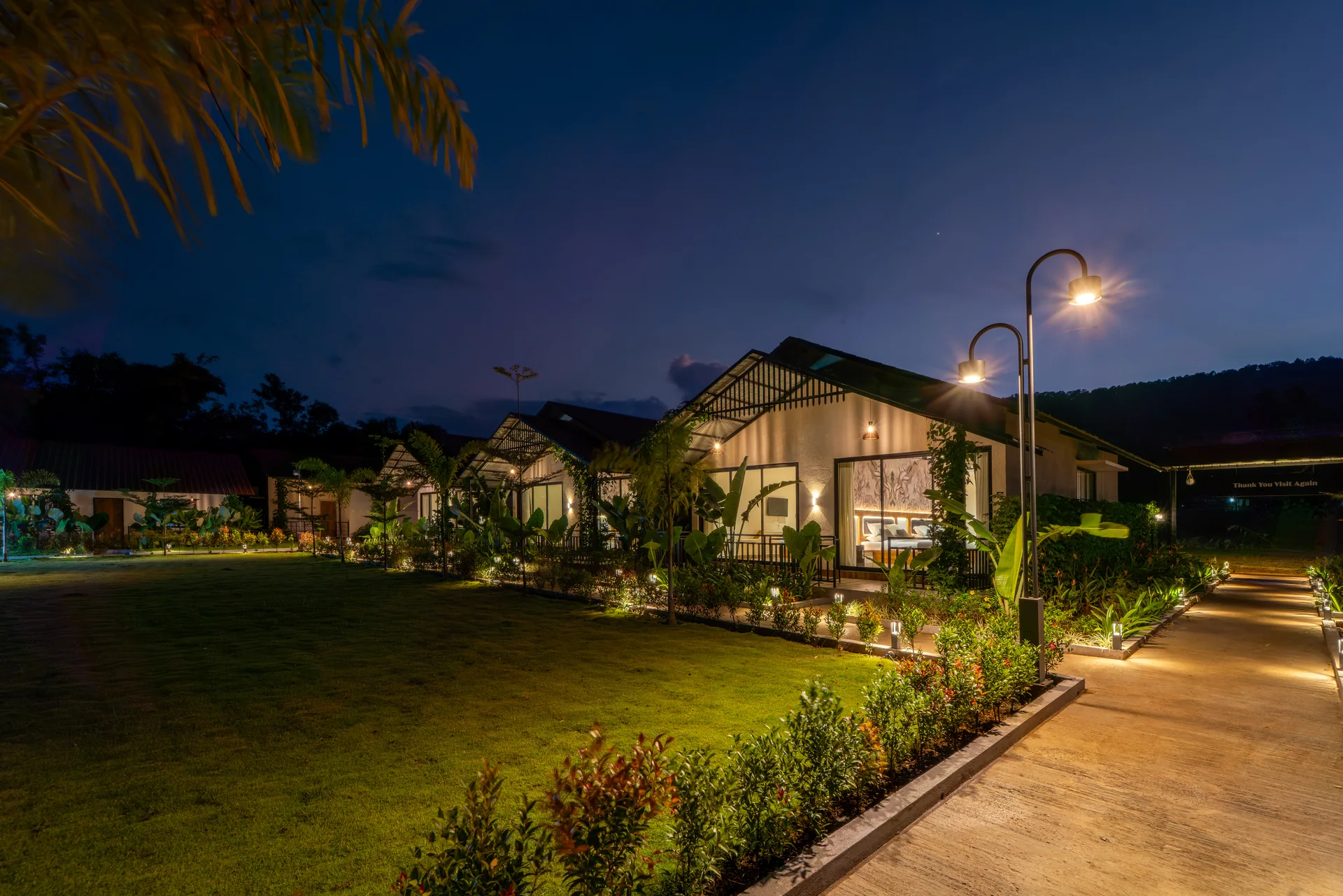 Evening lights along the garden at Nadi Teera, Dandeli