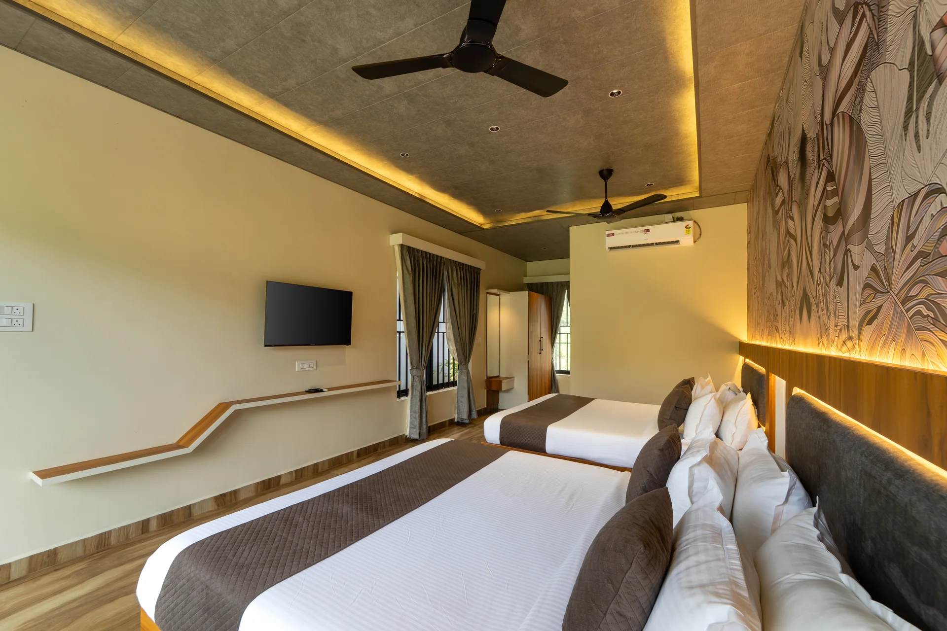 Premium Cottage beds and seating at Nadi Teera, Dandeli